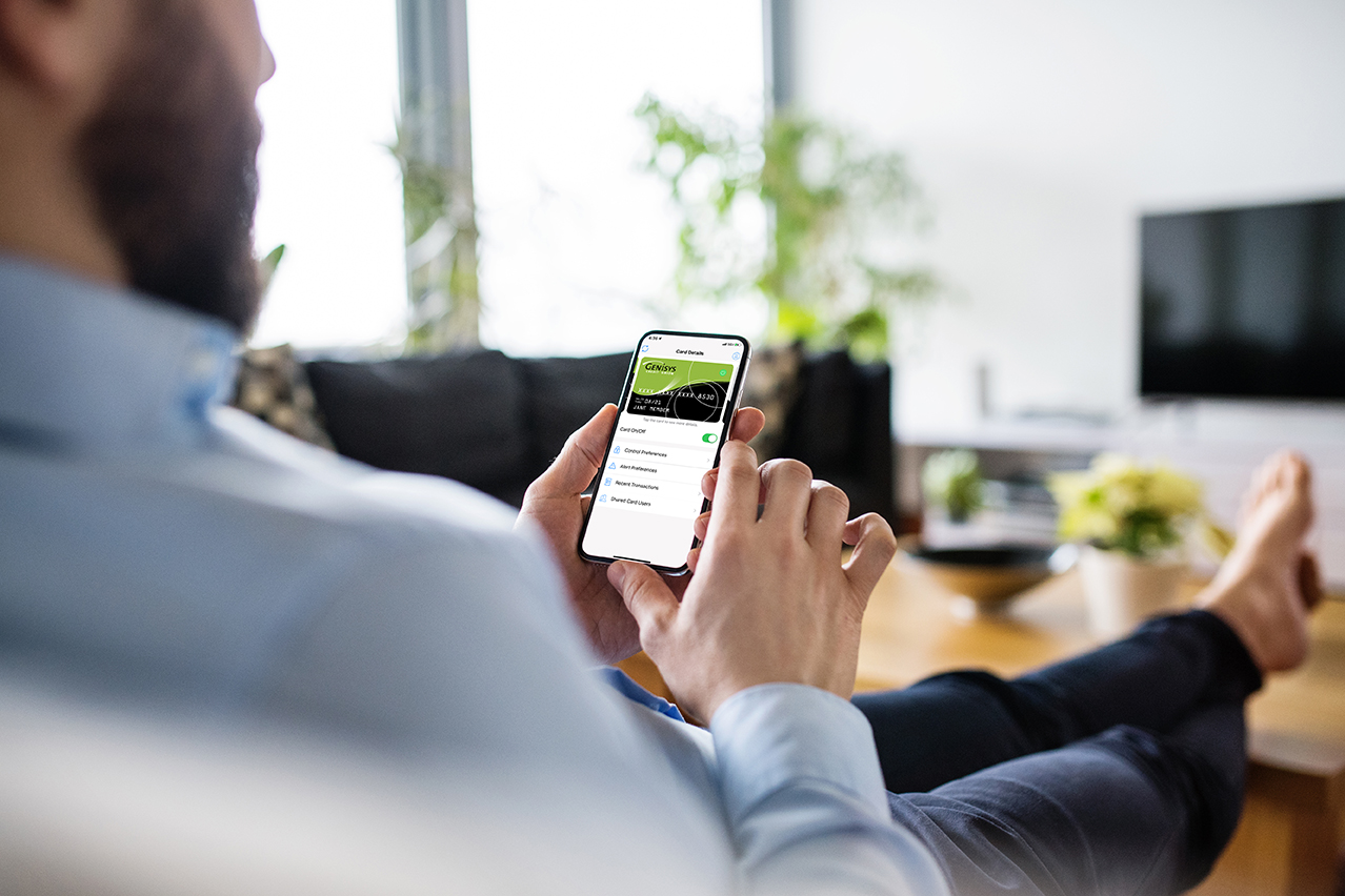 man using smartphone with credit card app