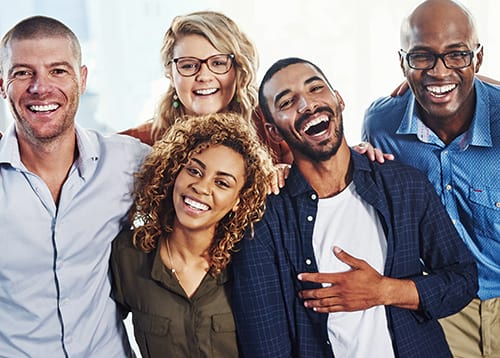 diverse group of people smiling and laughing