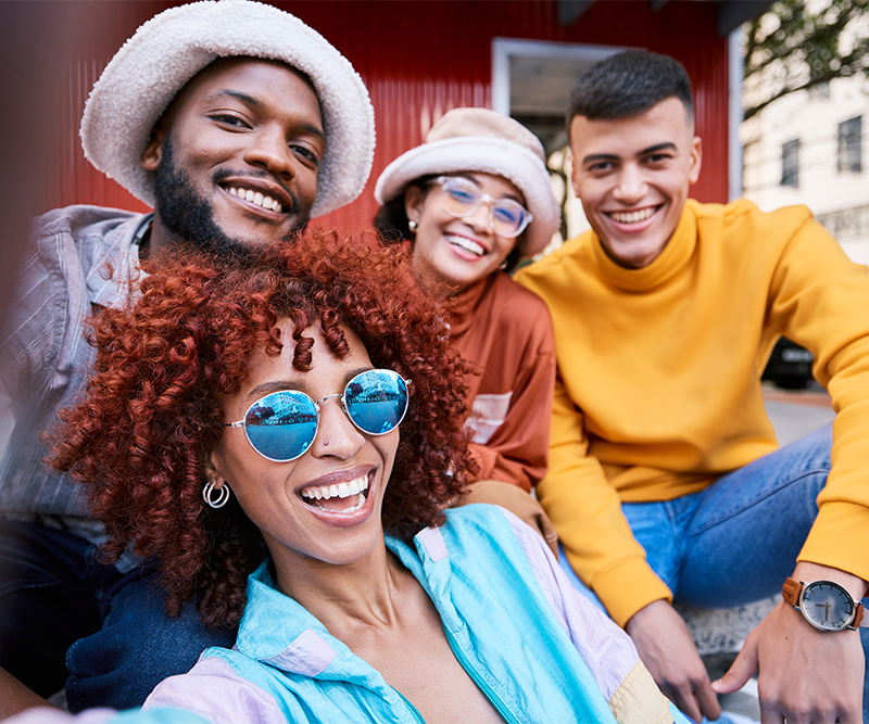 four friends taking a selfie together