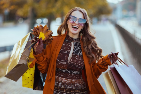 Woman with shopping bags in hand