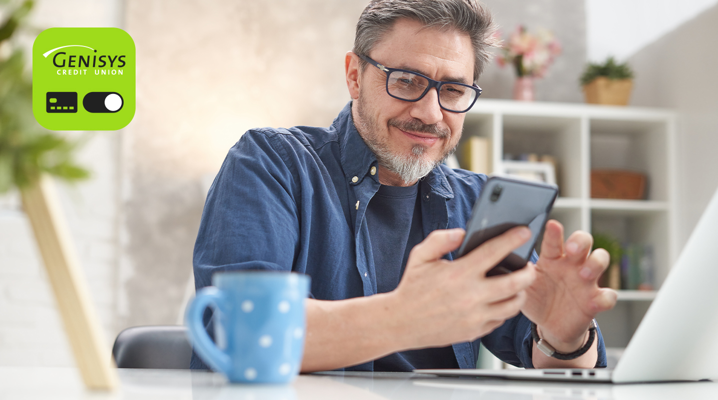 man looking at smartphone