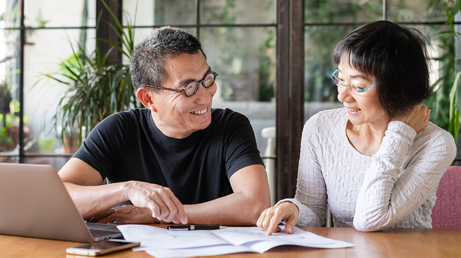 Couple looking at desk