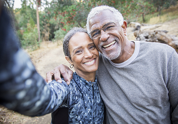happy couple taking selfie