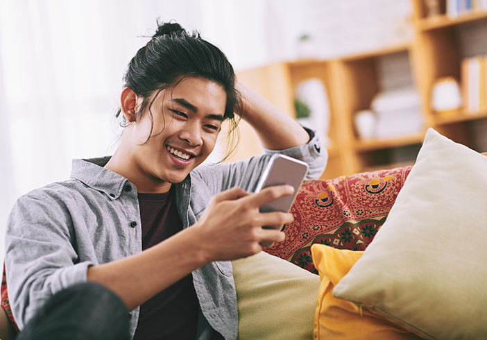 happy man on smartphone