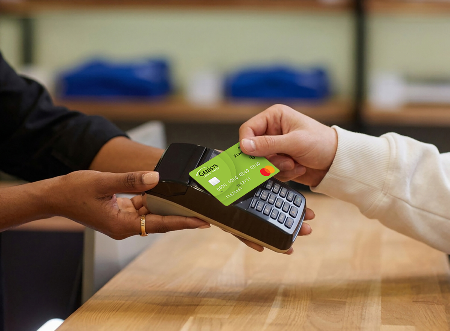 Genisys Debit Rewards card being used at a point of sale