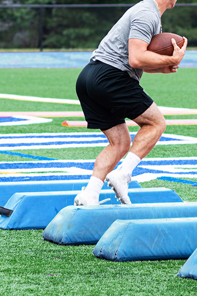 football player practicing agility