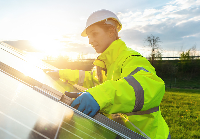 woman with solar panels