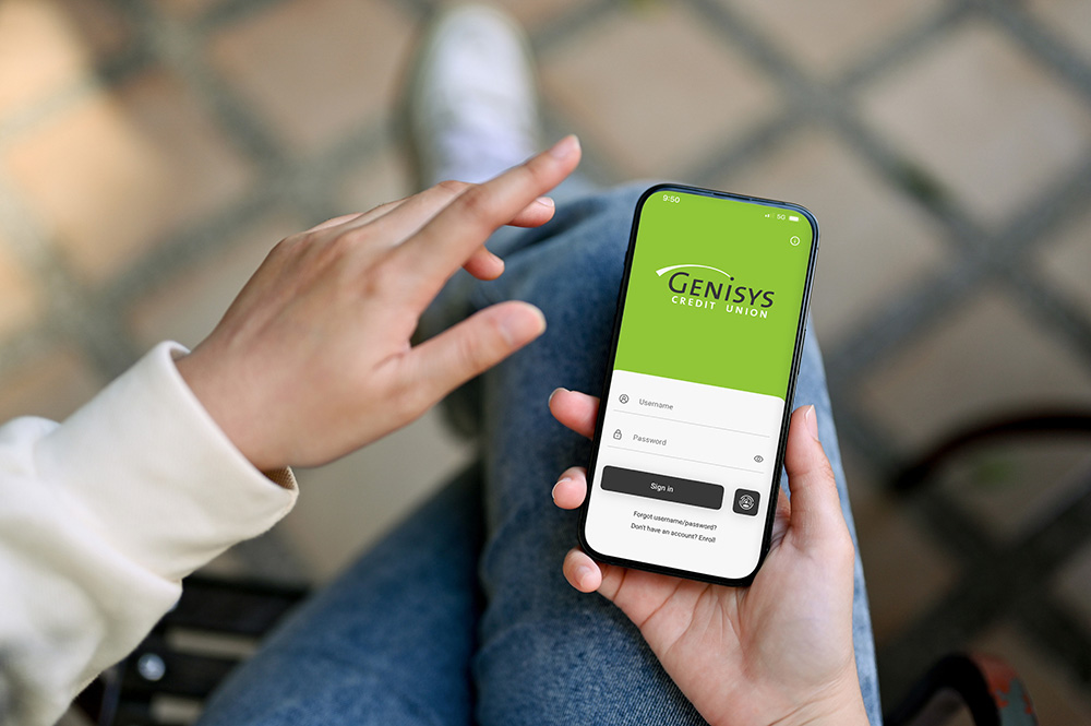 woman using genisys mobile app